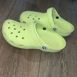 Lime green crocs. Men’s 8s Woman’s 10s.